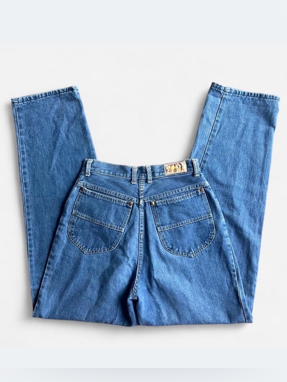 Vintage Manisha high waisted blue denim jeans 27” waist made in Hong Kong